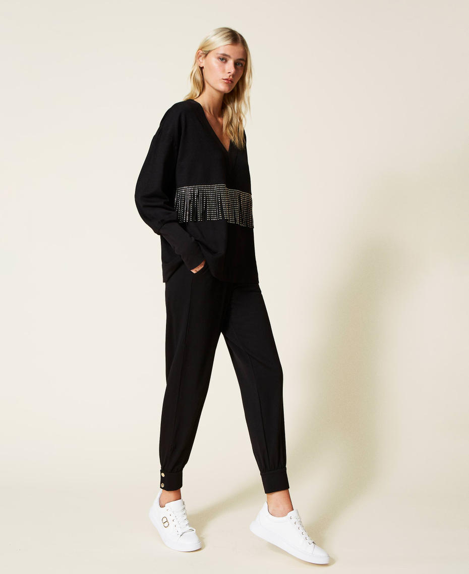 Plush fabric joggers with buttons