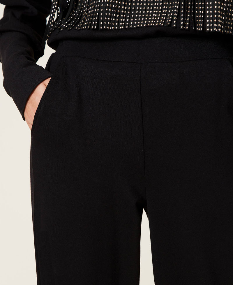 Plush fabric joggers with buttons