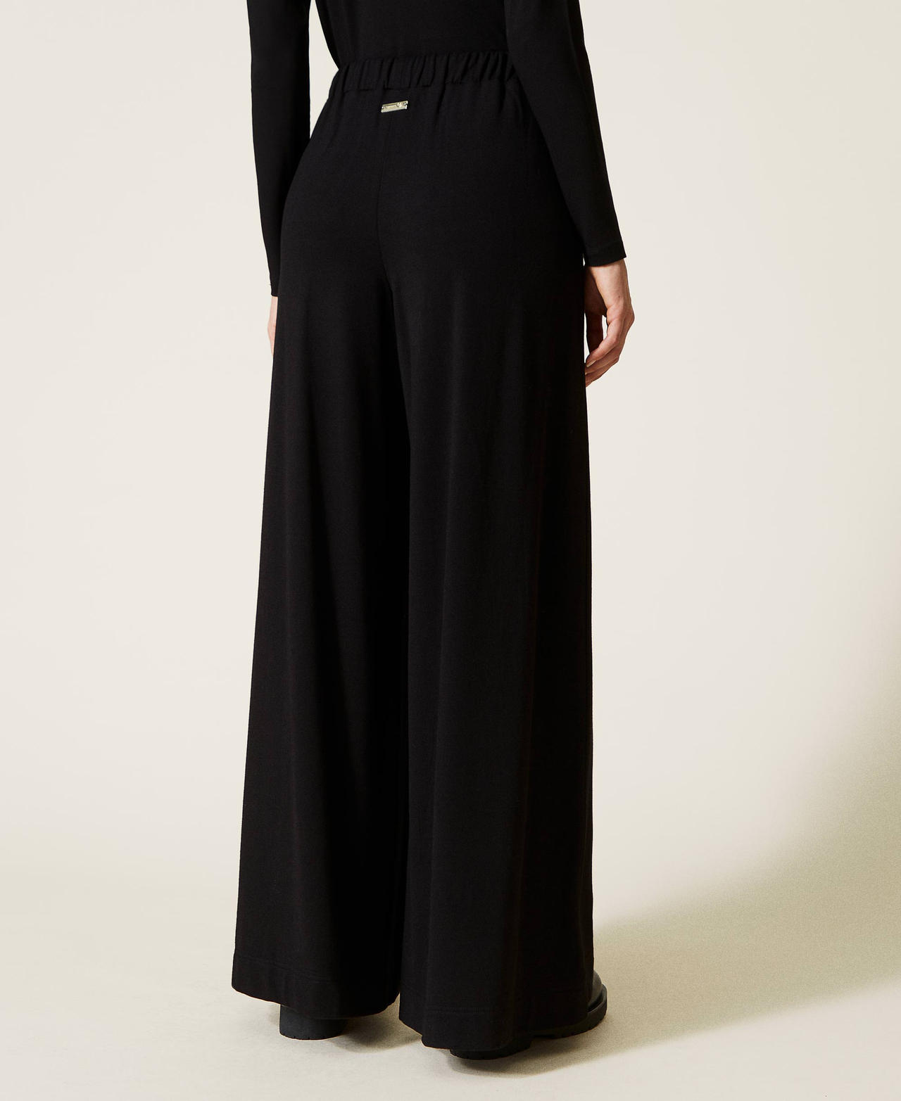 Plush fabric palazzo trousers with pleats Black Woman 222LL2SBB-03