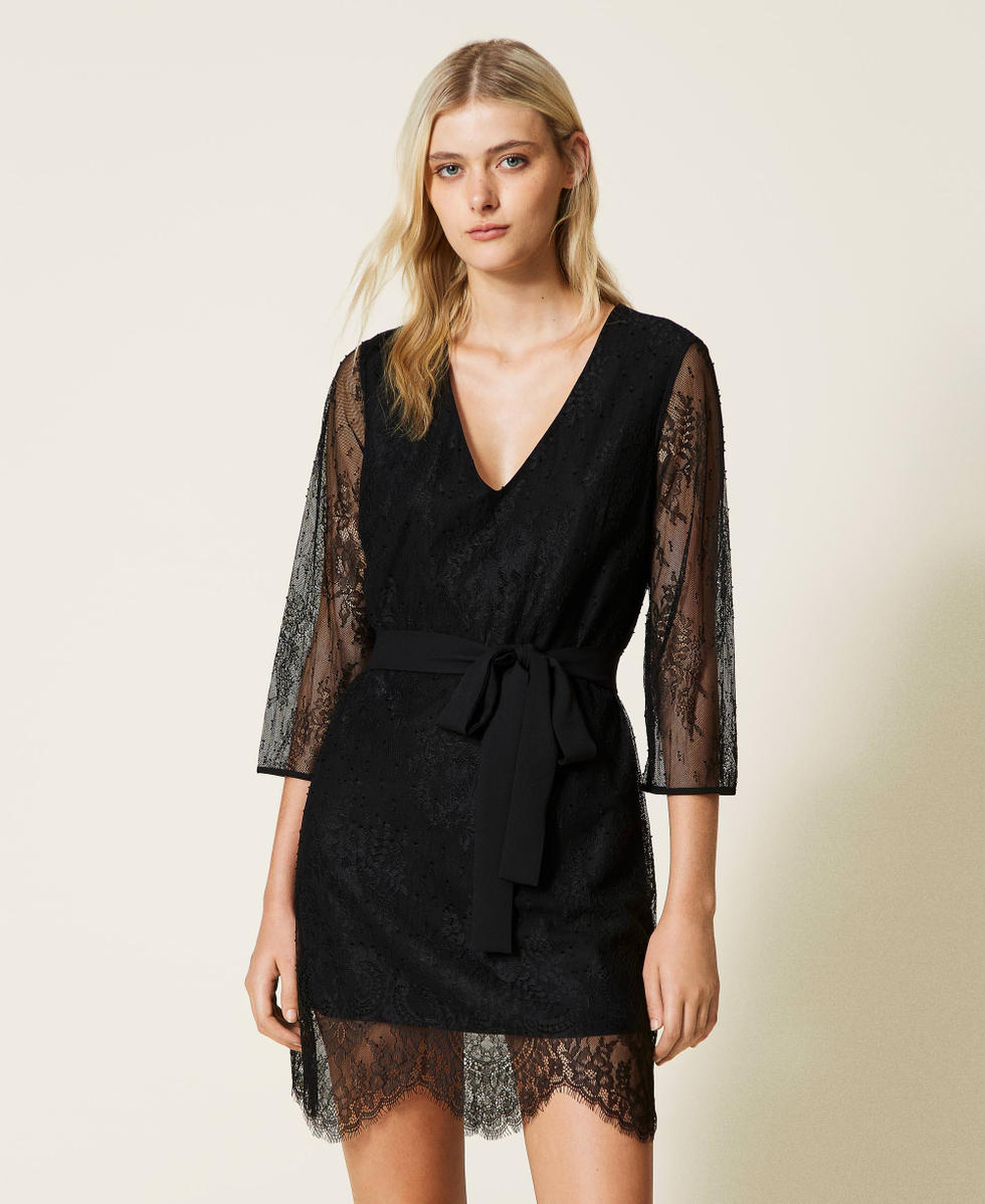 Sleeveless high low belted black lace dress 2025