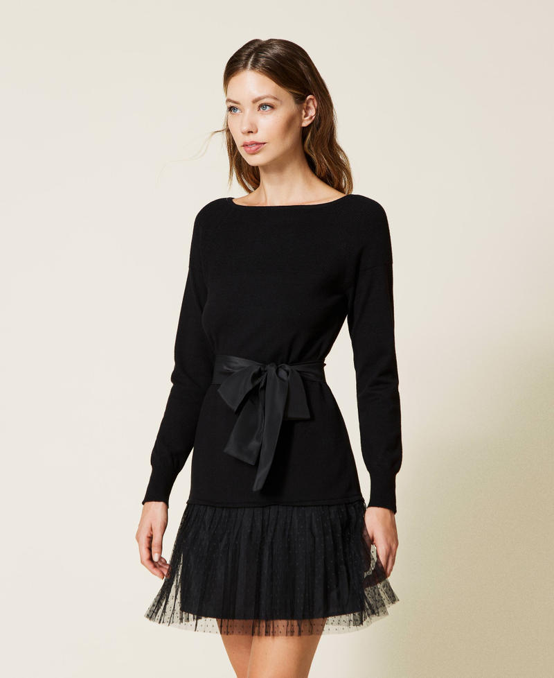 Knit dress with tulle flounce and belt