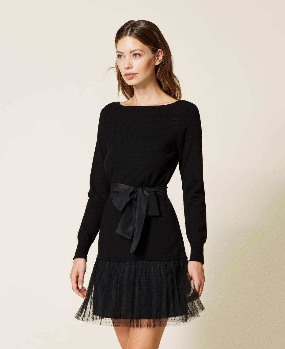 Knit dress with tulle flounce and belt
