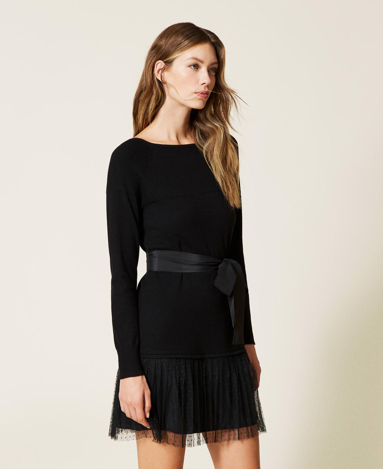 Knit dress with tulle flounce and belt