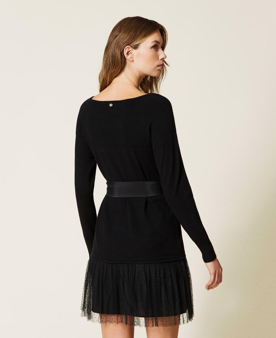 Knit dress with tulle flounce and belt
