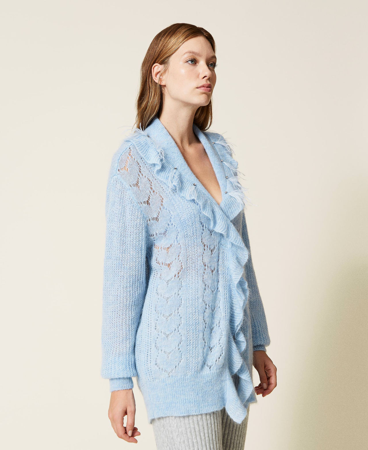 Cardigan oversize avec plumes et strass