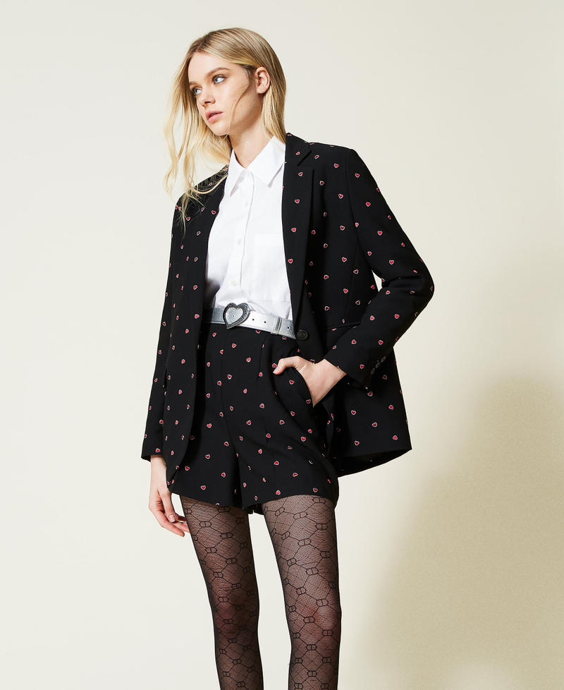 Leather belt with heart shaped buckle