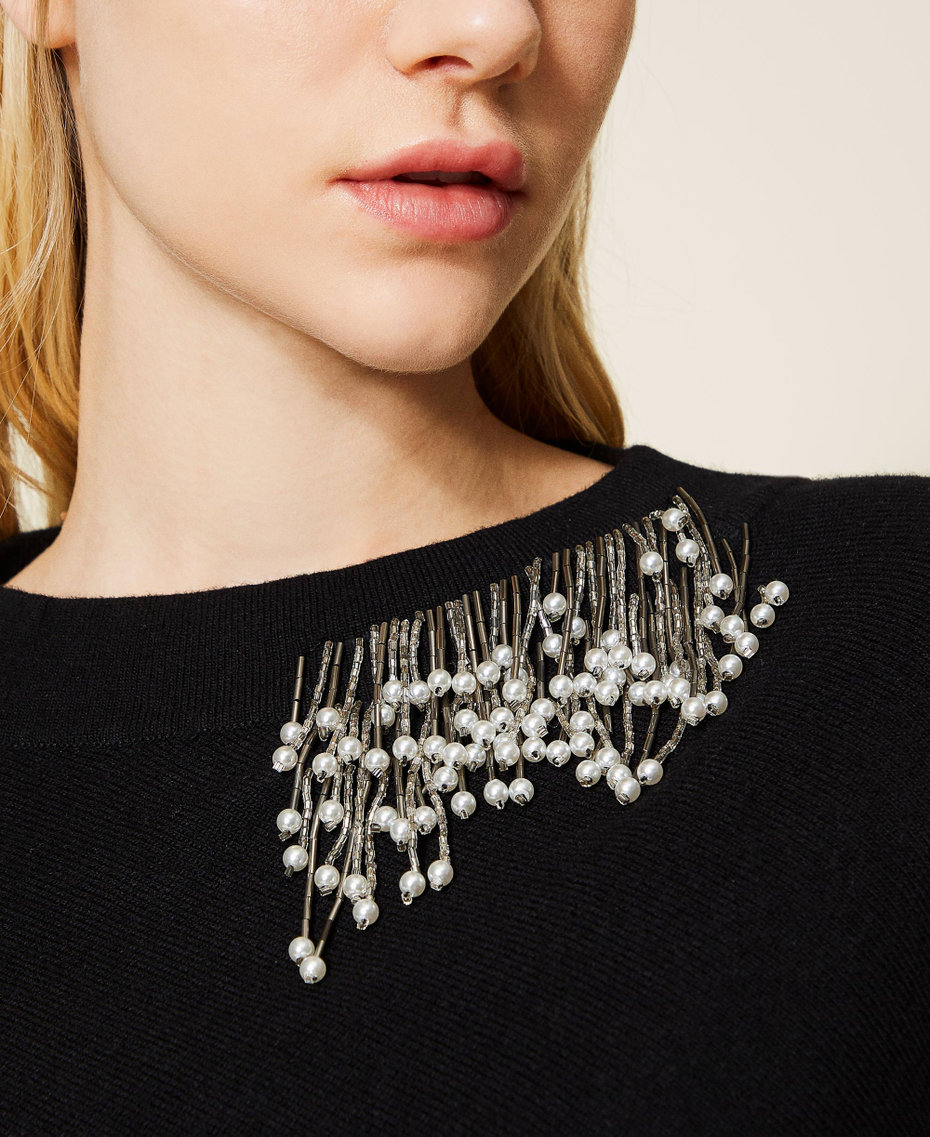 Wool blend poncho with handmade embroidery