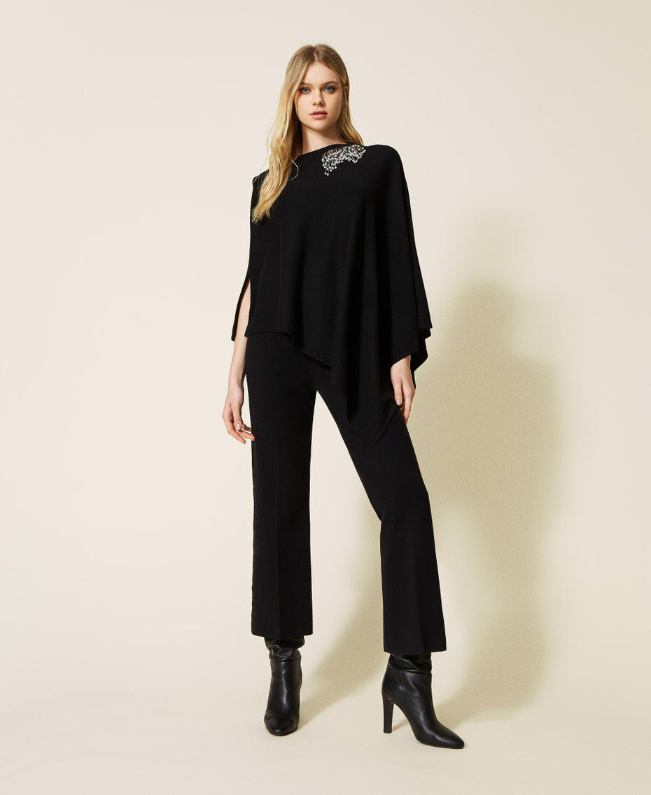 Wool blend poncho with handmade embroidery