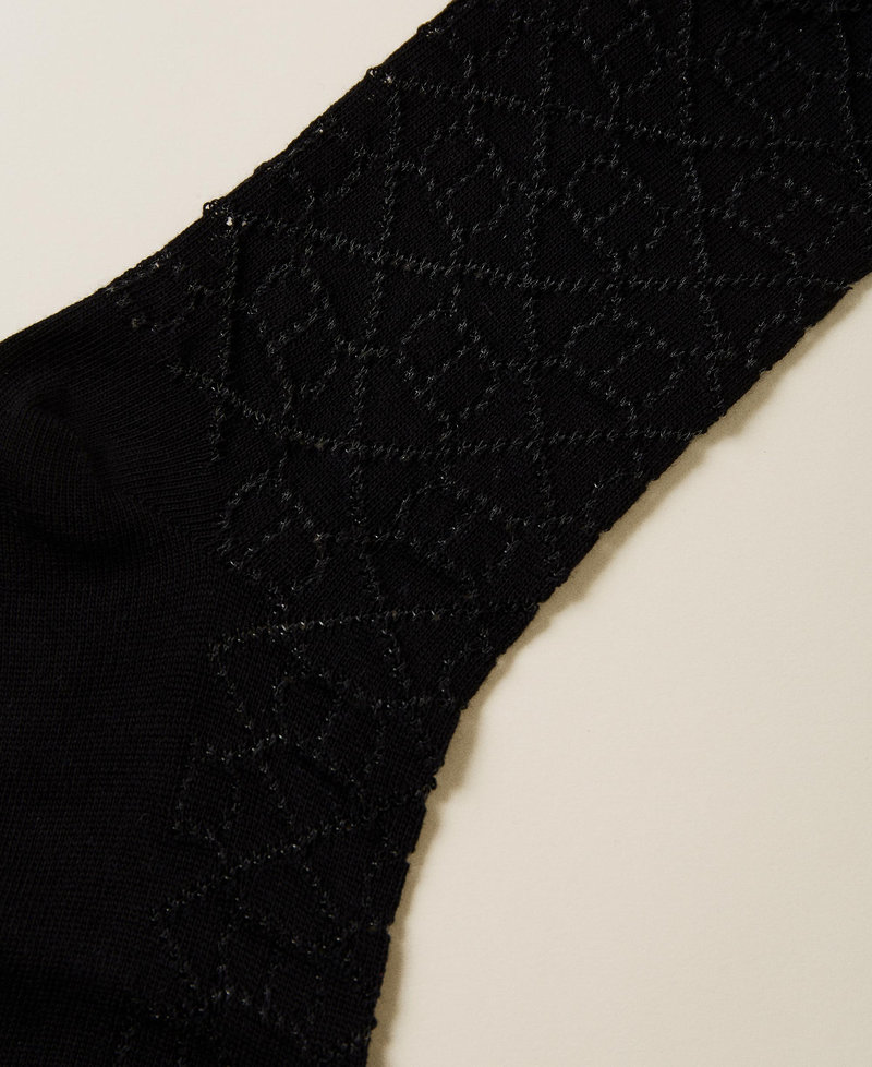 Strümpfe mit perforierten „Oval T“-Logos  Schwarz Frau 222TA4128_00006_02