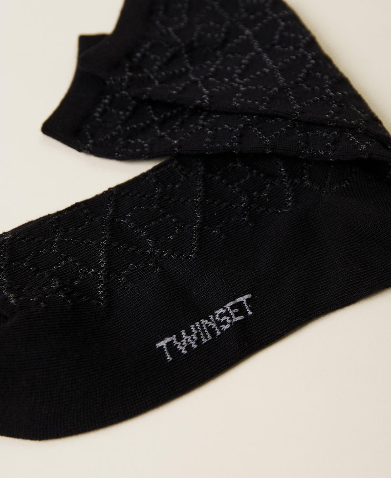 Strümpfe mit perforierten „Oval T“-Logos  Schwarz Frau 222TA4128_00006_03
