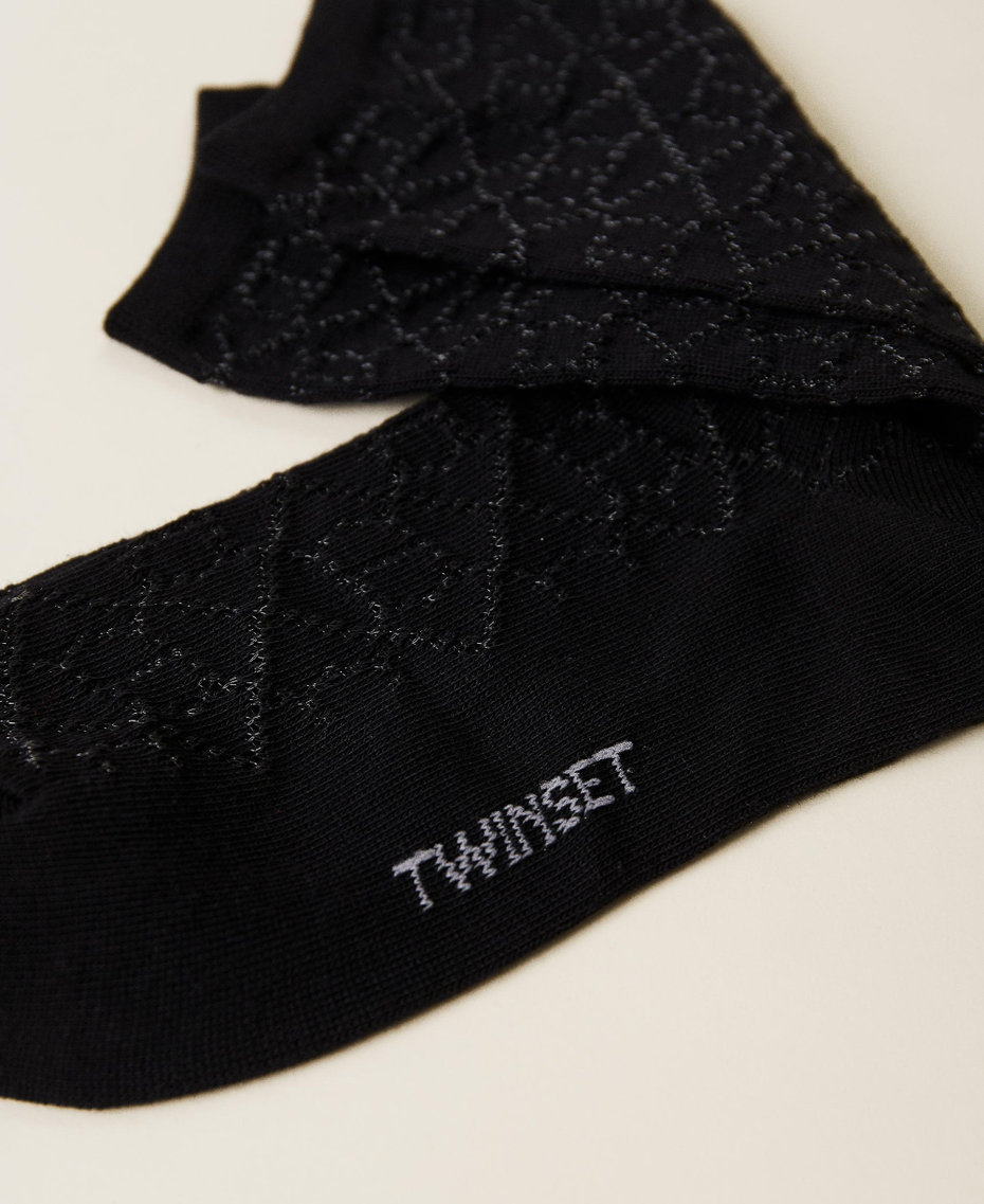 Strümpfe mit perforierten „Oval T“-Logos  Schwarz Frau 222TA4128_00006_03
