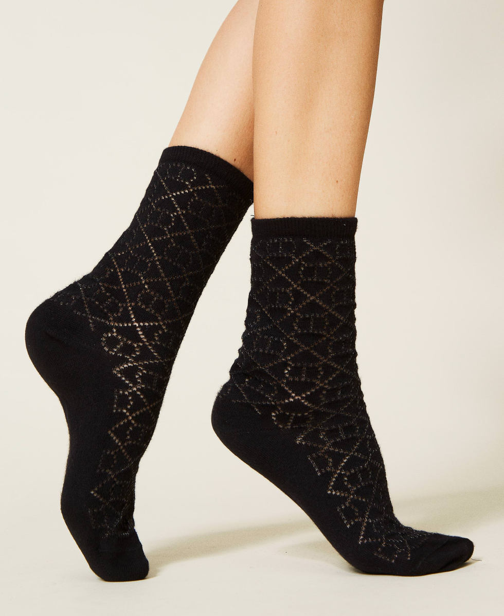 Chaussettes ajour&eacute;es avec logo Oval T