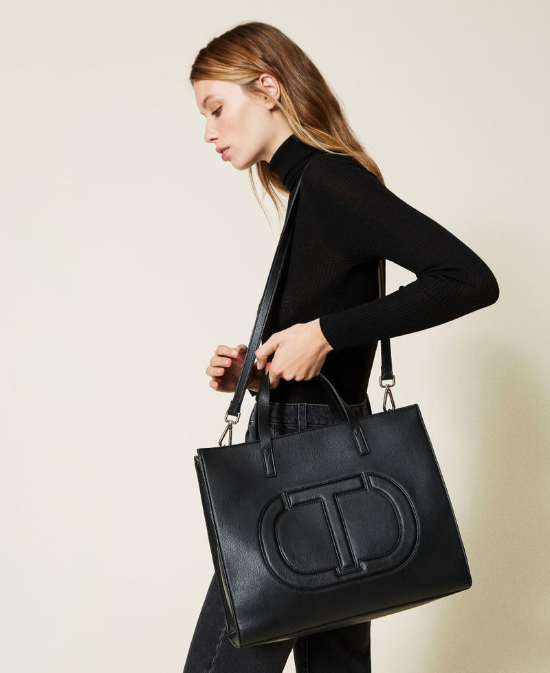 Shopper with inlaid logo