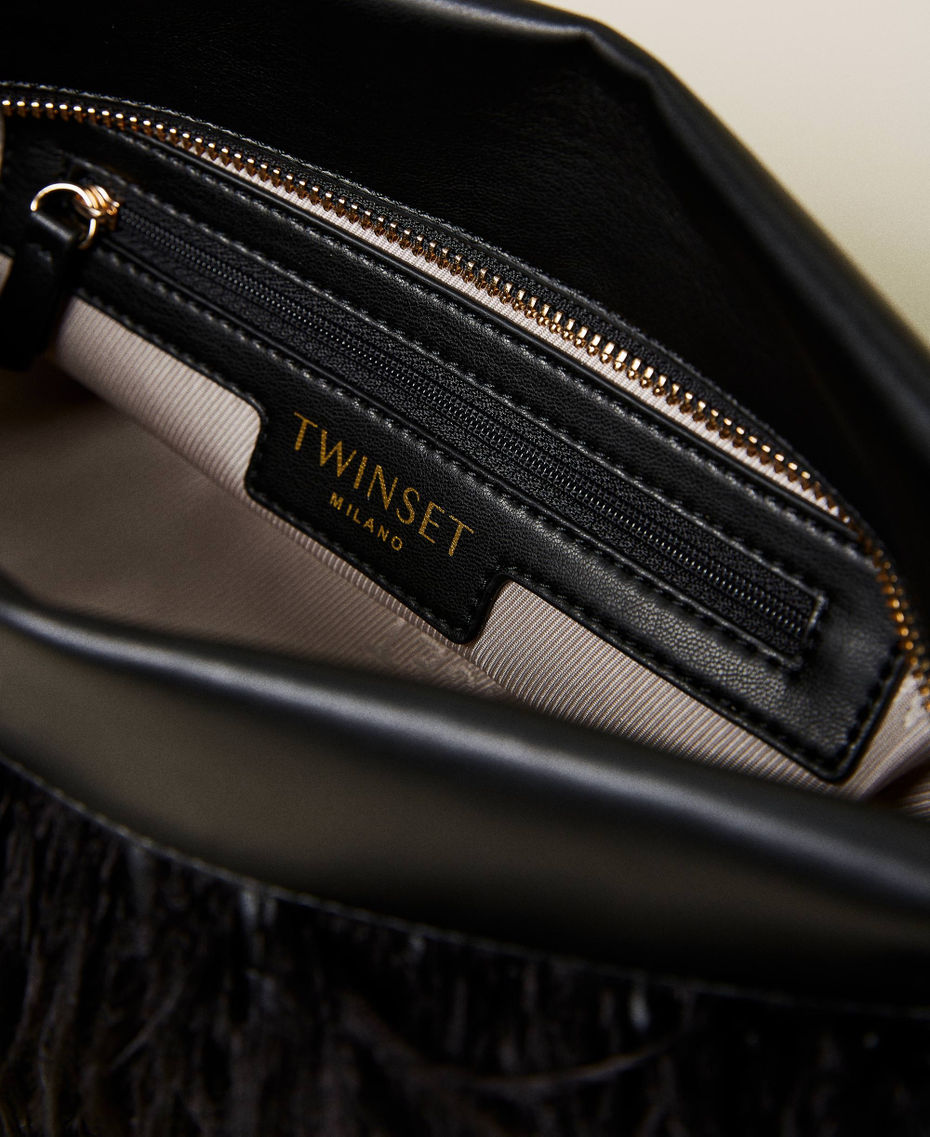 Clutch bag with feathers