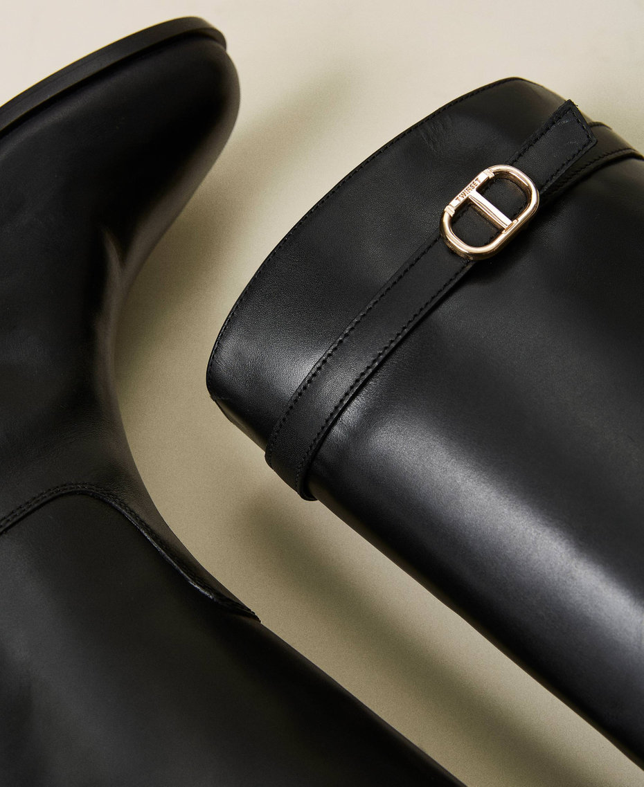 Leather boots with strap