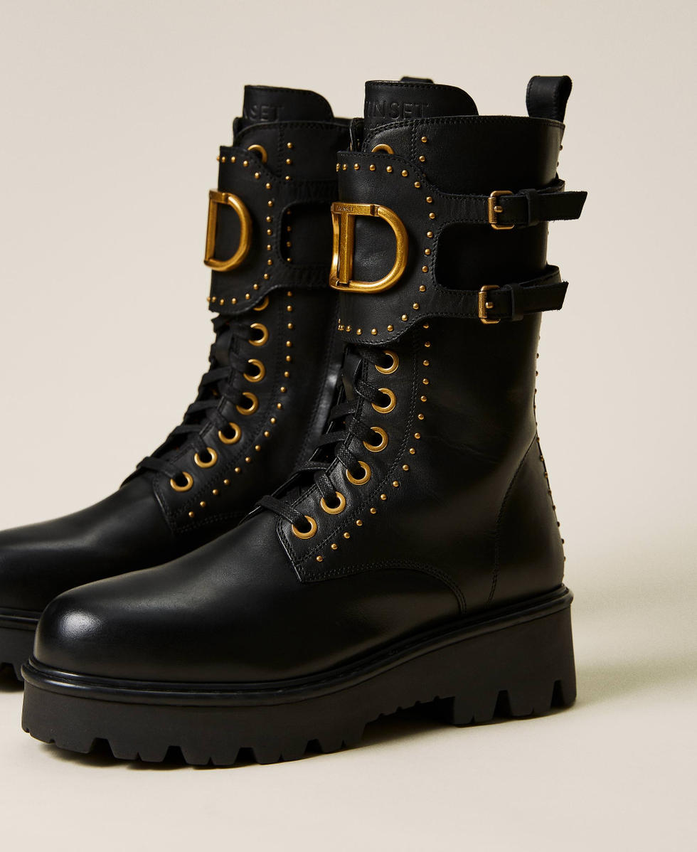 Leather combat boots with rivets and logo