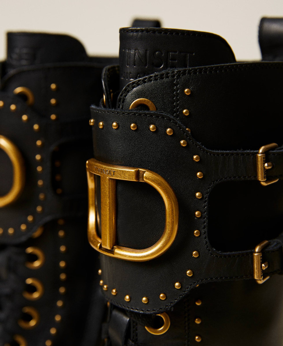 Leather combat boots with rivets and logo