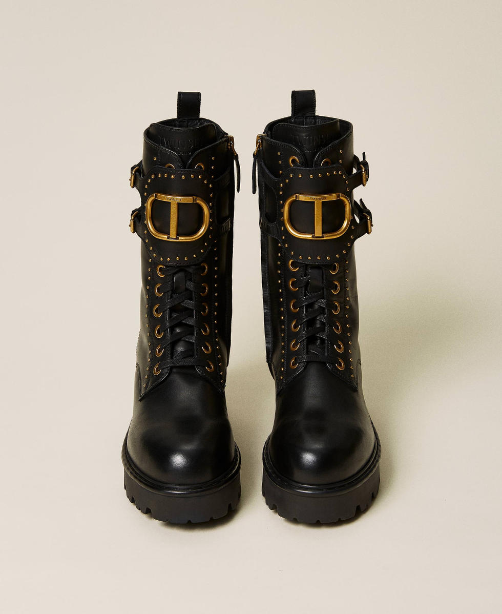 Leather combat boots with rivets and logo