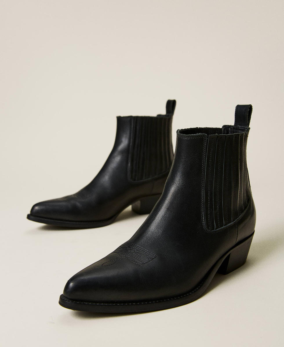 Stivaletti texani deals in pelle