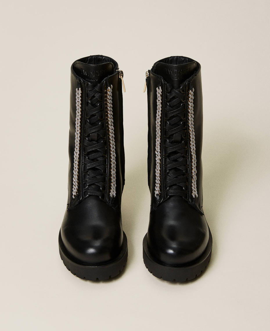Leather combat boots with rhinestone chain