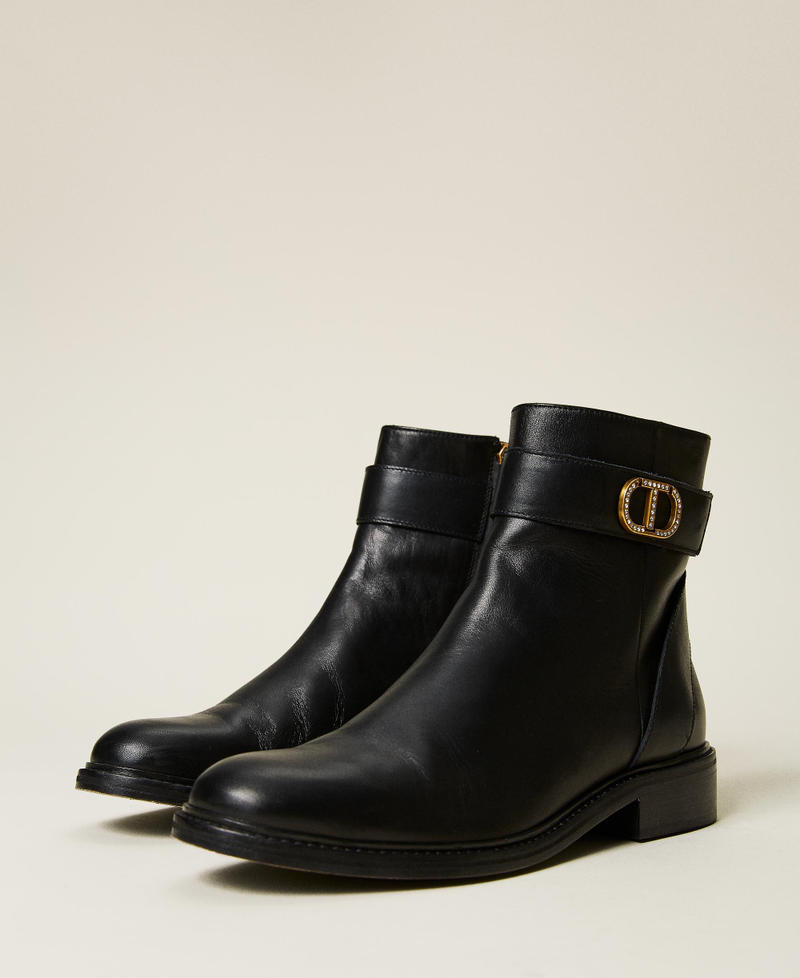 Leather ankle boots with Oval T logo