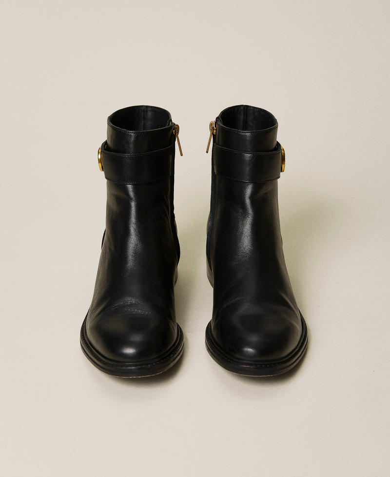 Leather ankle boots with Oval T logo