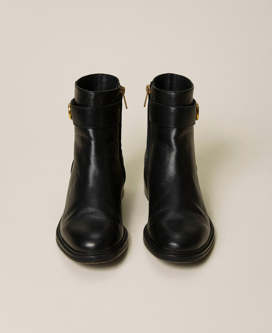 Leather ankle boots with Oval T logo