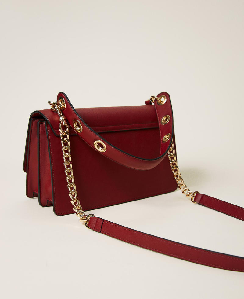 'Naira' shoulder bag with eyelets and logo