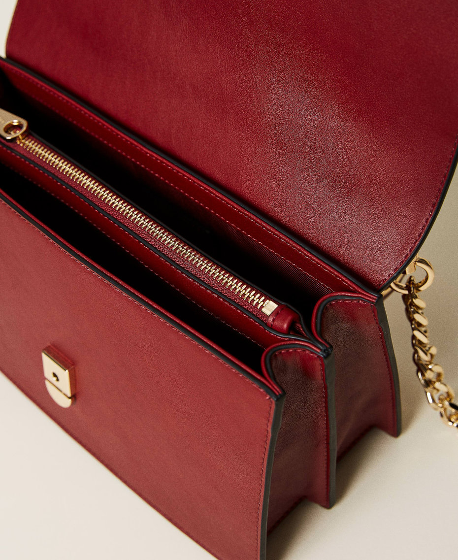 'Naira' shoulder bag with eyelets and logo