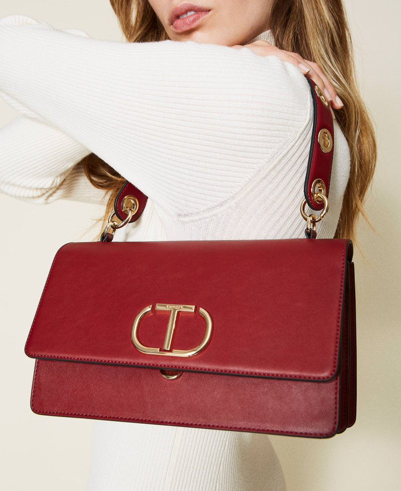 'Naira' shoulder bag with eyelets and logo