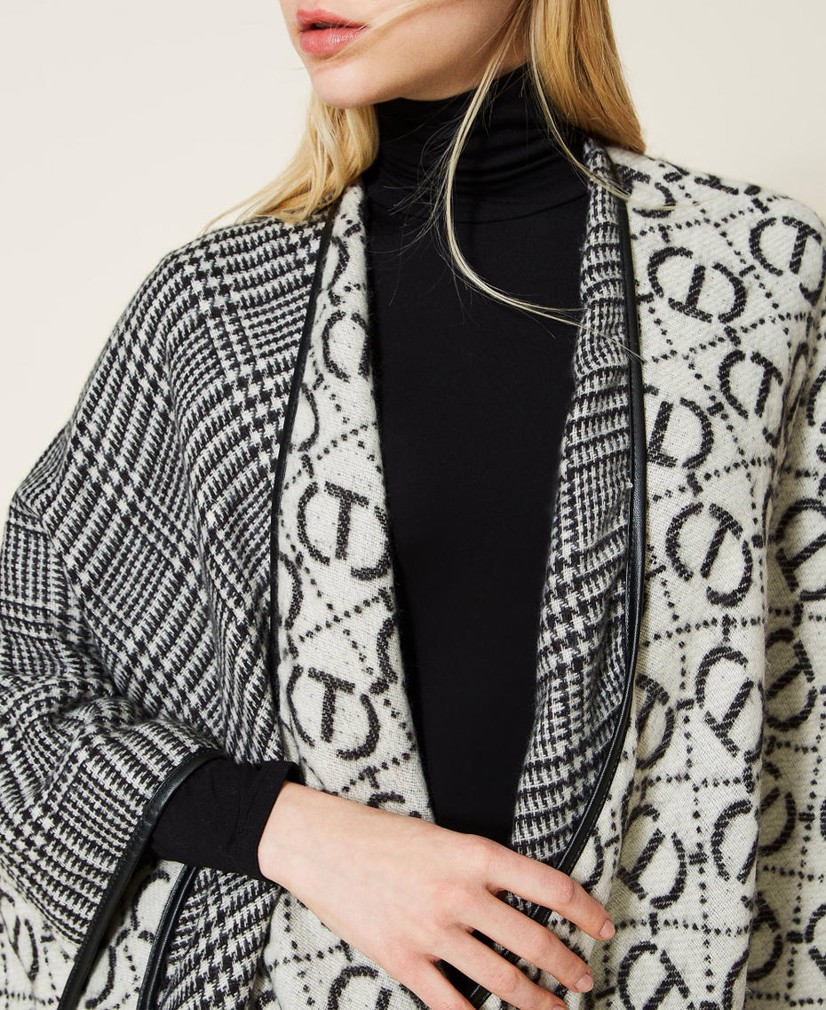 Jacquard poncho with Oval T logo