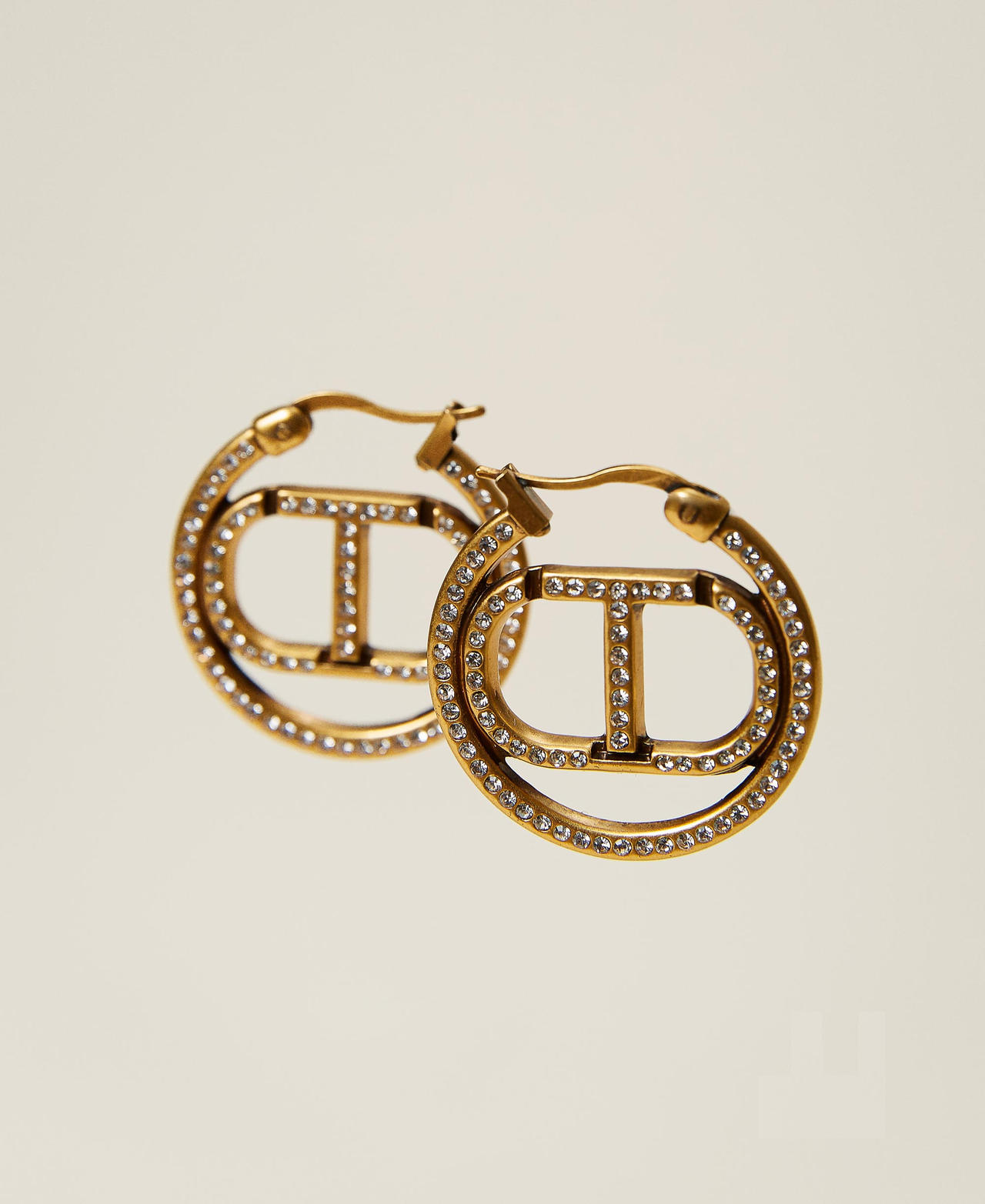 Boucles d’oreilles avec logo Oval T et strass Or « Laiton Vieilli Cuivré » Femme 222TO506K-02