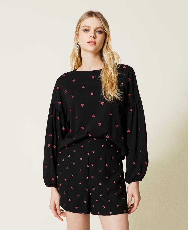 Cr&ecirc;pe blouse with embroidered hearts