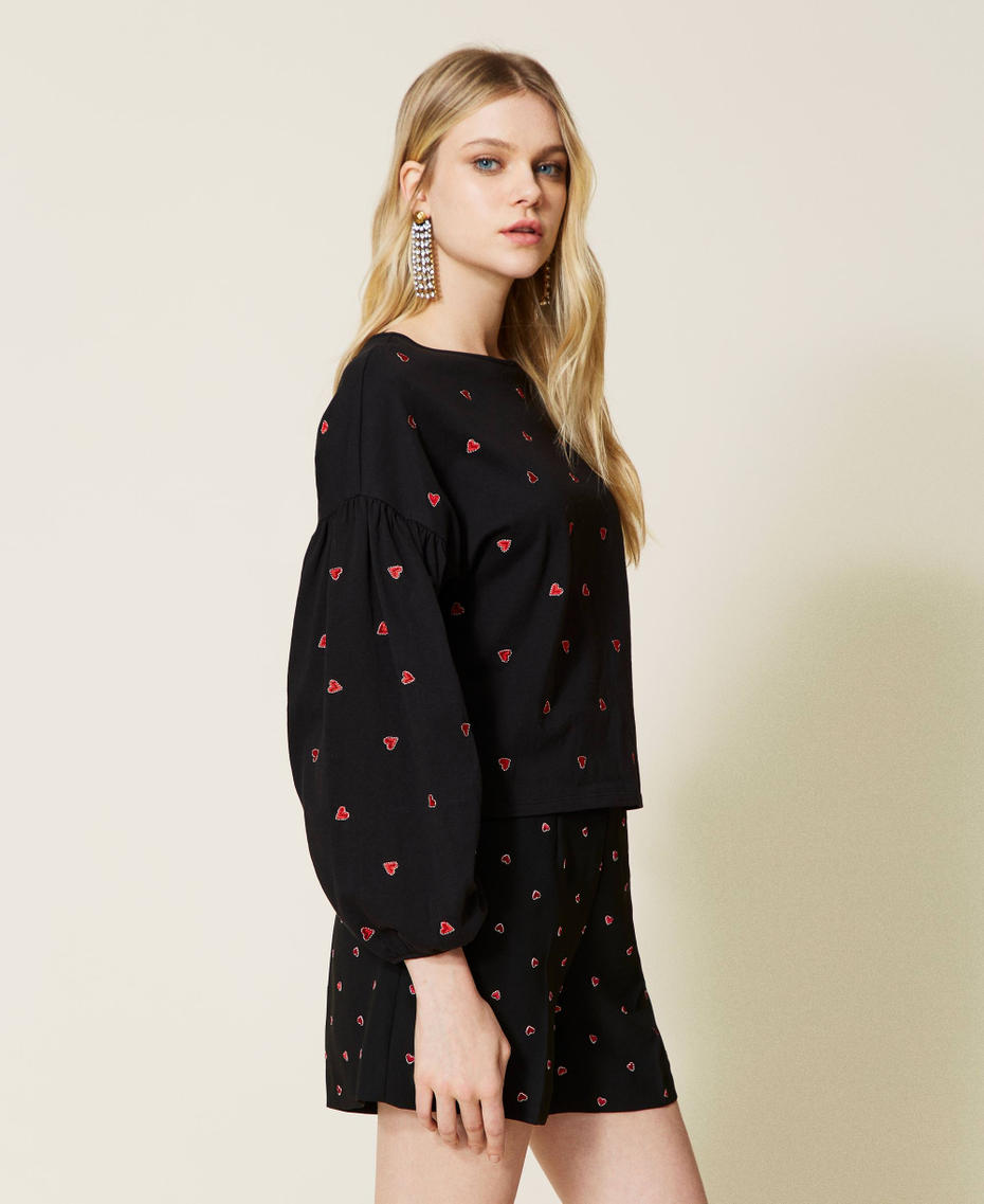 Cr&ecirc;pe blouse with embroidered hearts