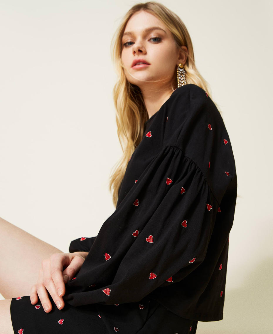 Cr&ecirc;pe blouse with embroidered hearts