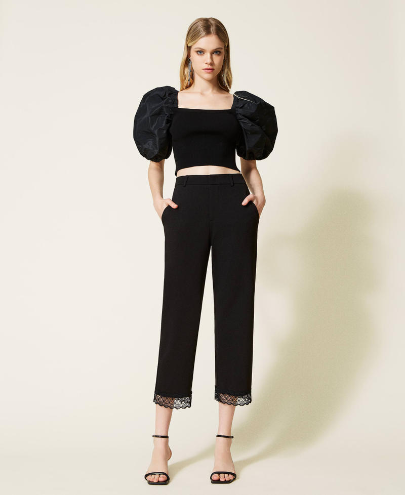 Cropped trousers with macram&eacute; lace