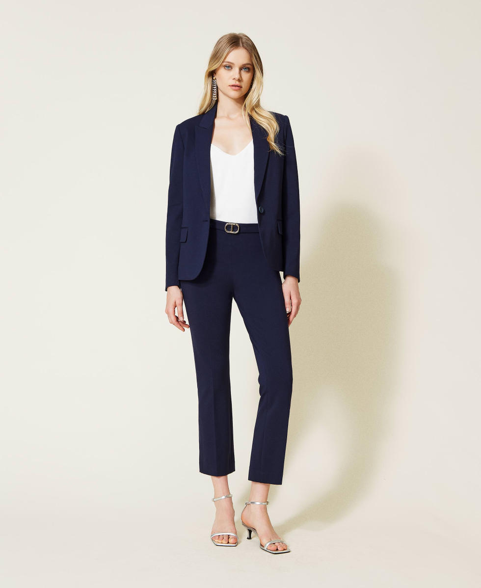 Pantalones flare con logotipo