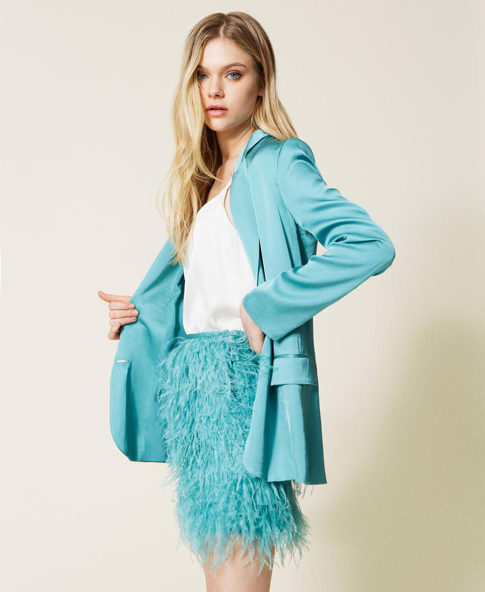 Mini-jupe en satin avec plumes