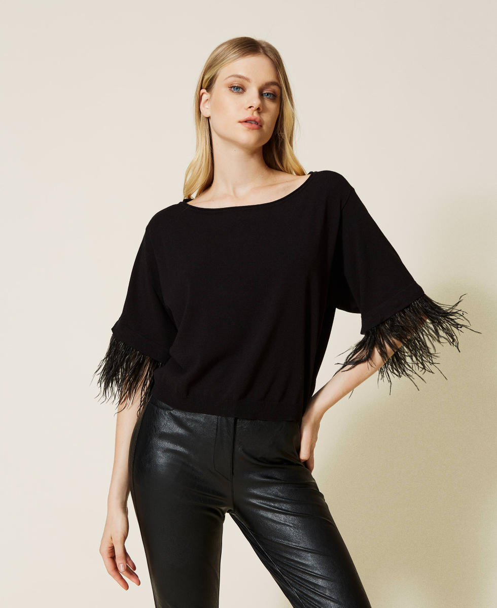 Maglia boxy con piume