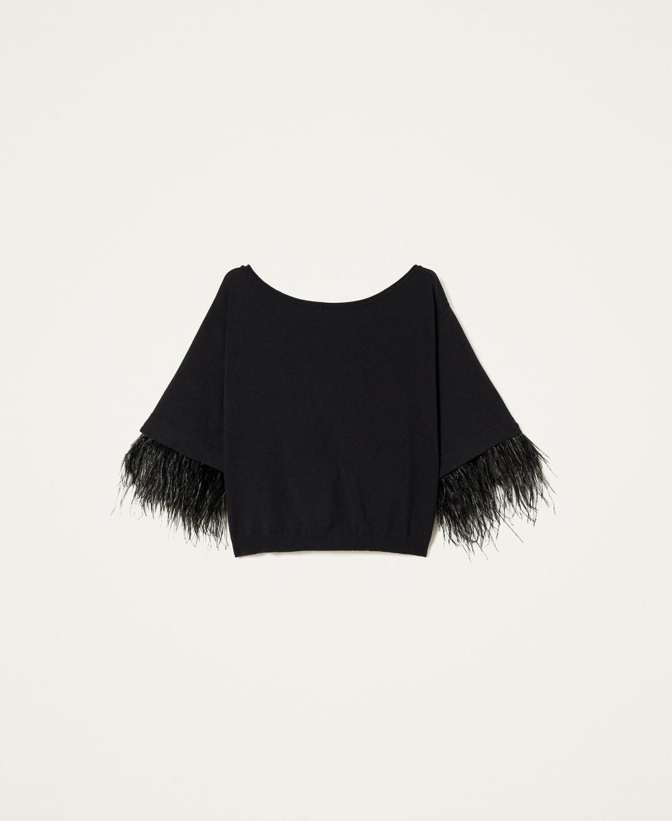 Pull boxy avec plumes