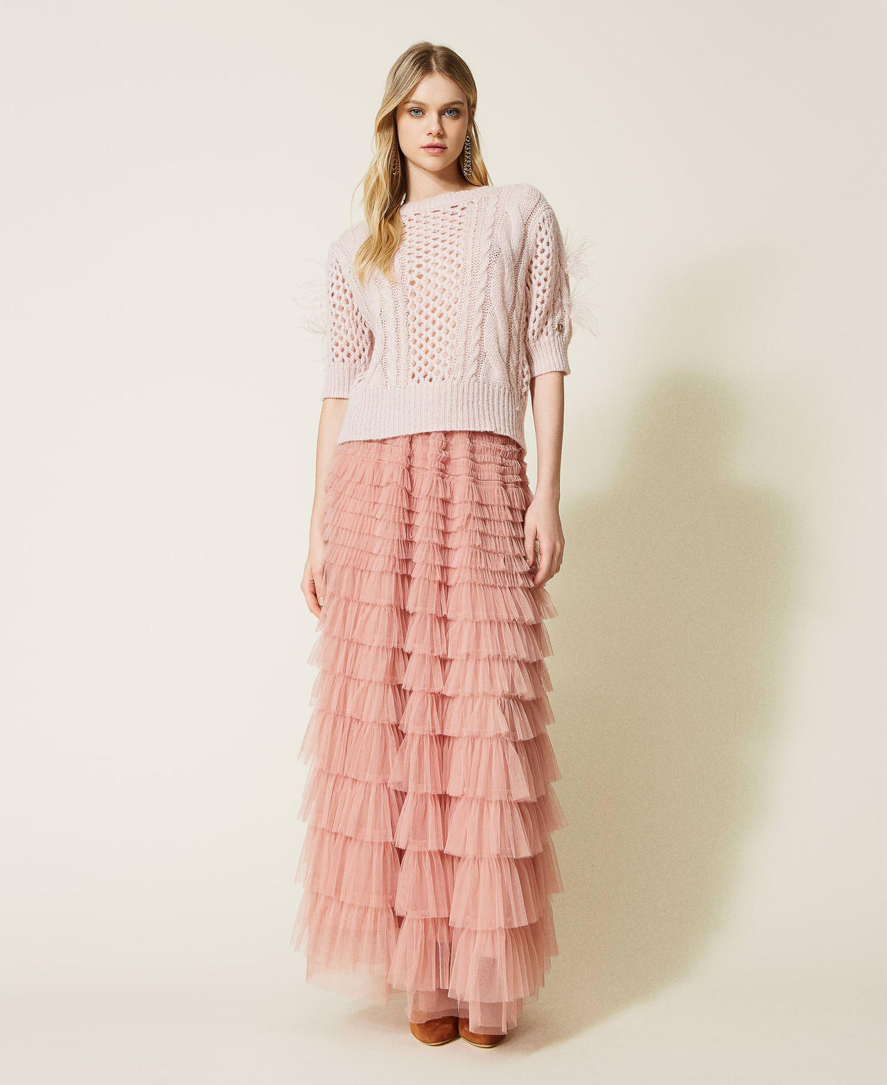 Cardigan-jumper with cable knit and feathers