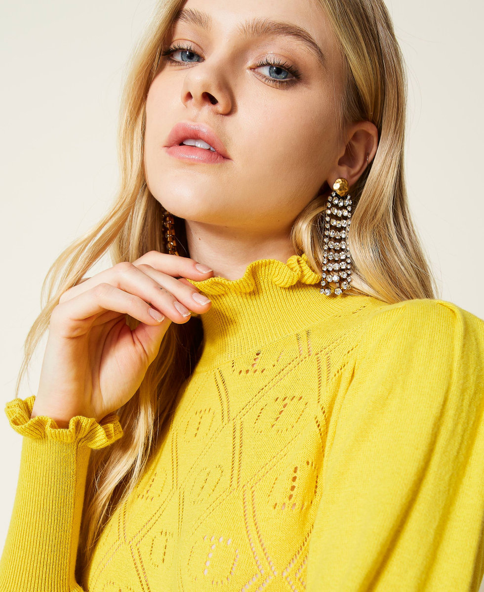 Turtleneck with openwork logo
