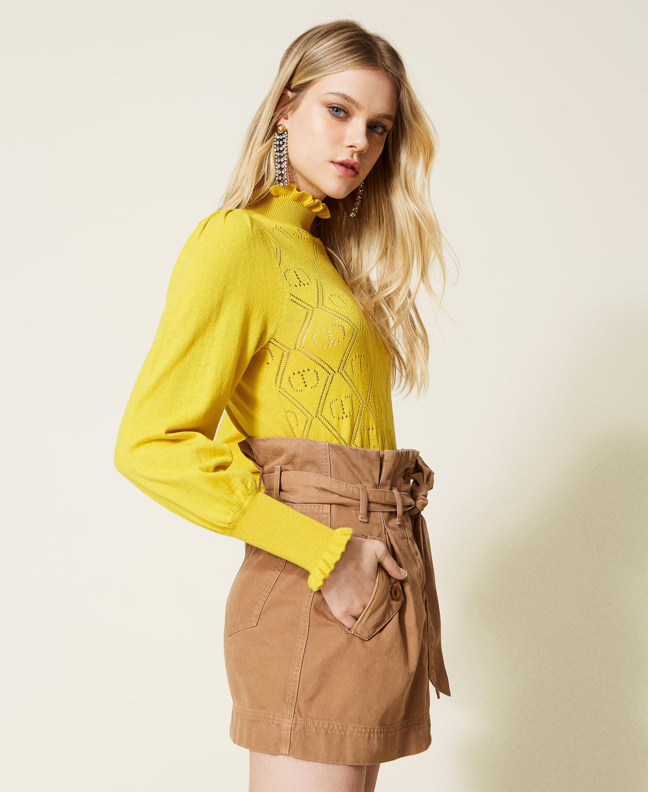 Turtleneck with openwork logo