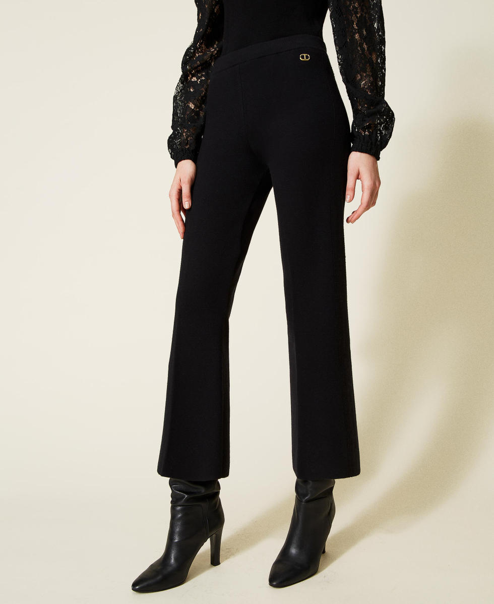 Pantaloni flare in maglia