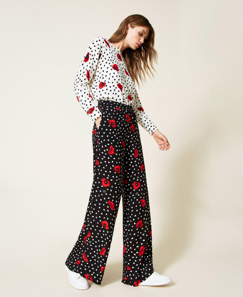 Trousers with heart and poppy print Black Romantic Poppy Print Woman 222TQ201C-03