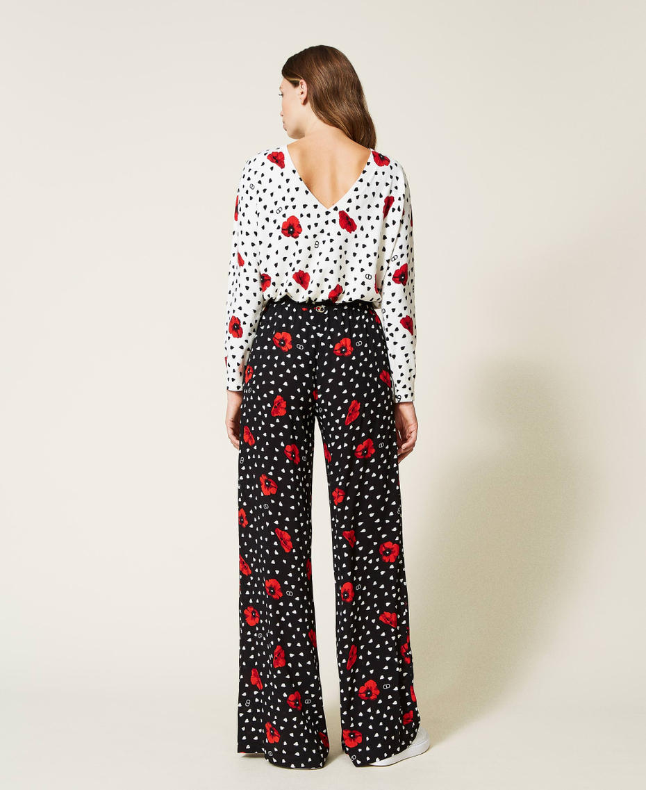 Trousers with heart and poppy print Black Romantic Poppy Print Woman 222TQ201C-04