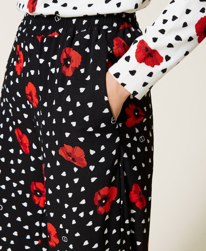 Trousers with heart and poppy print Black Romantic Poppy Print Woman 222TQ201C-05