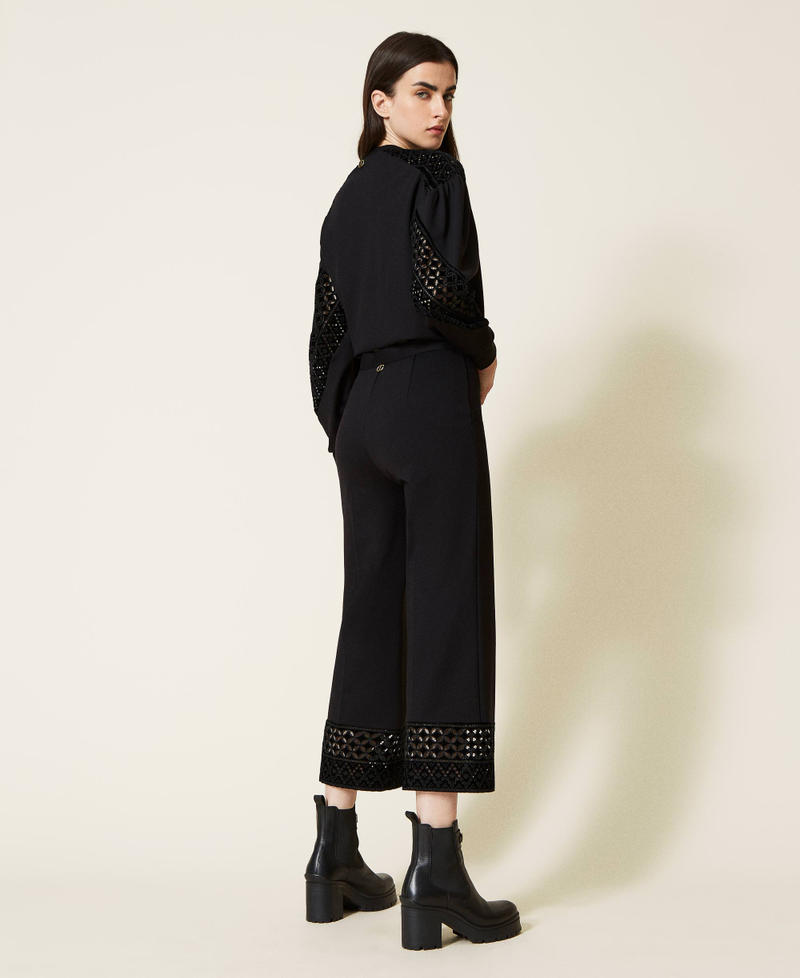 Cropped trousers with velvet embroidery