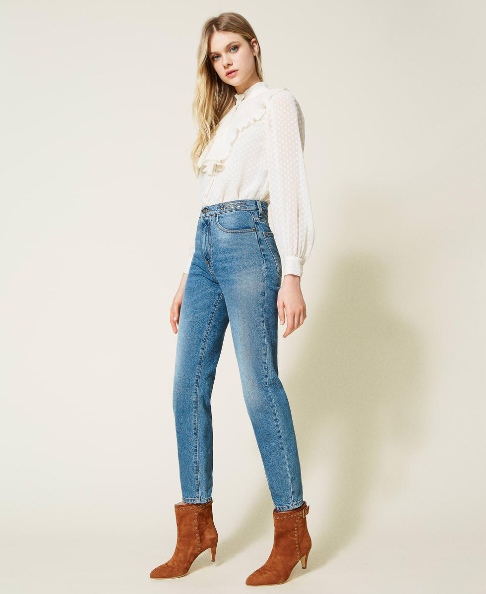 Jeans regular con morsetti e logo