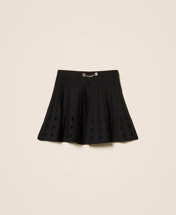 Short openwork knit skirt